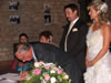 Sole's dad signs the wedding certificate